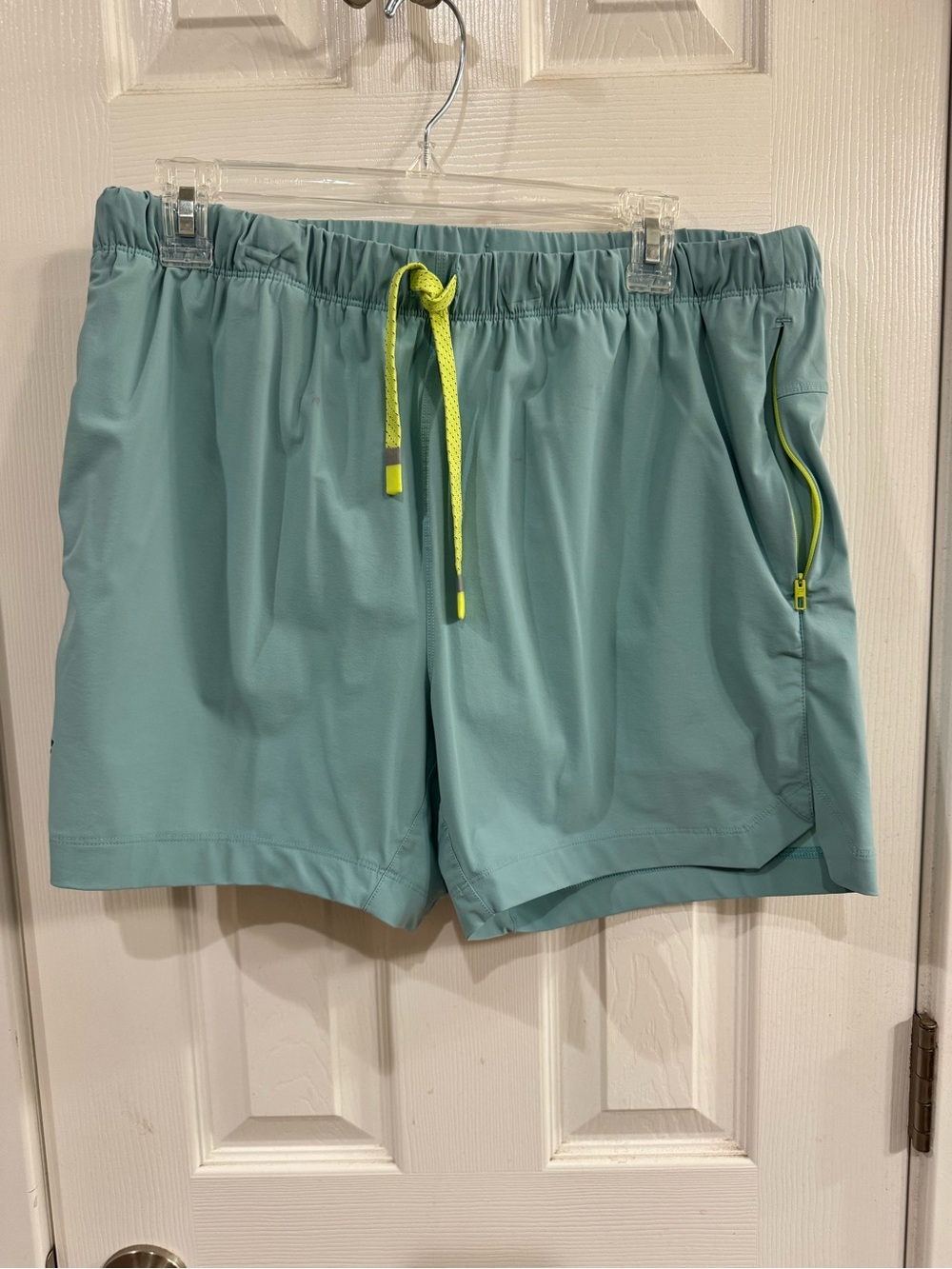 Fabletics Light Teal Athletic Shorts with Neon Yellow Accents - Picture 6 of 9